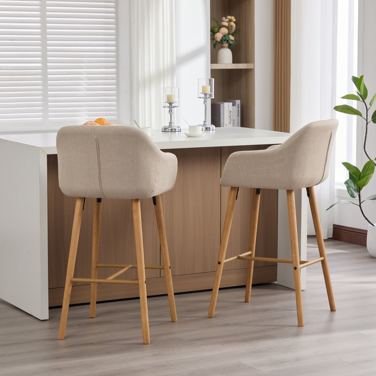 Modern linen upholstered bar stool with backrest, armrests, footrest, and solid wood legs by Start2Finish.