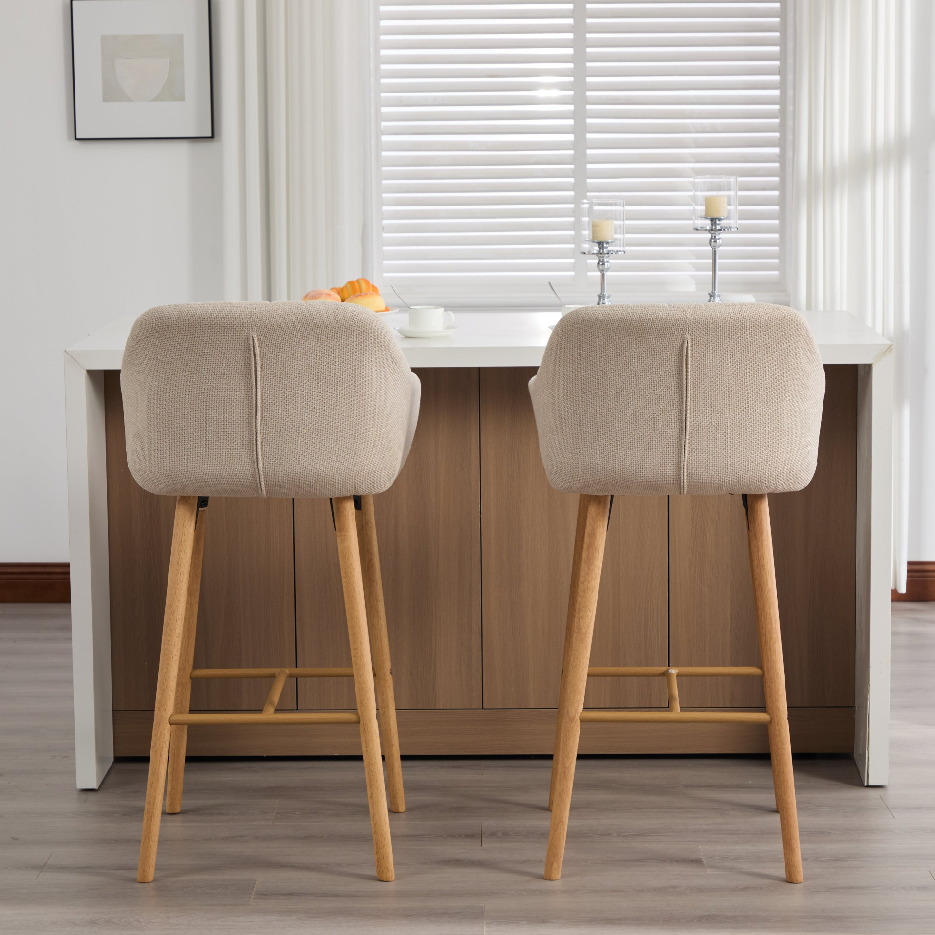 Modern linen upholstered bar stool with back, armrests, footrest, and solid wood legs by Start2Finish