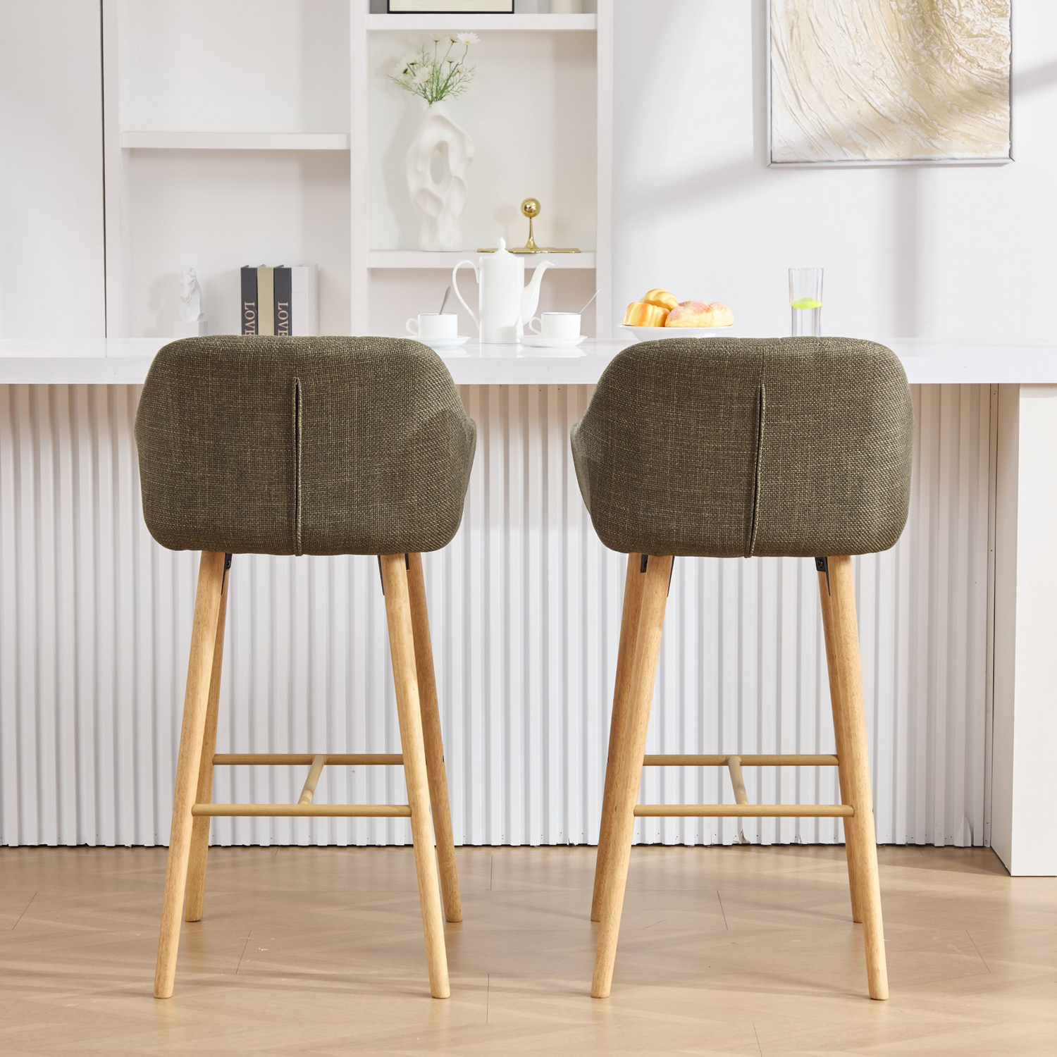 Modern linen upholstered bar stool with back, armrests, footrest, and solid wood legs by Start2Finish.