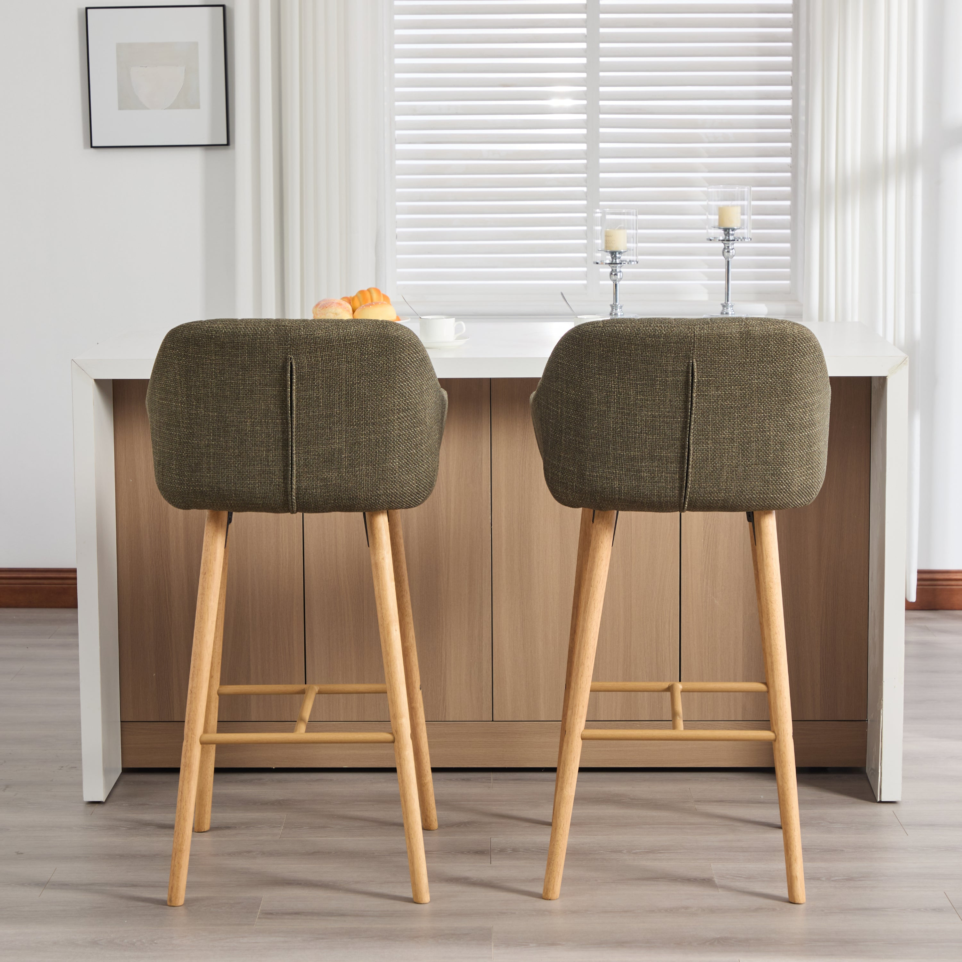 Modern linen upholstered bar stool with back, armrests, footrest, and solid wood legs by Start2Finish