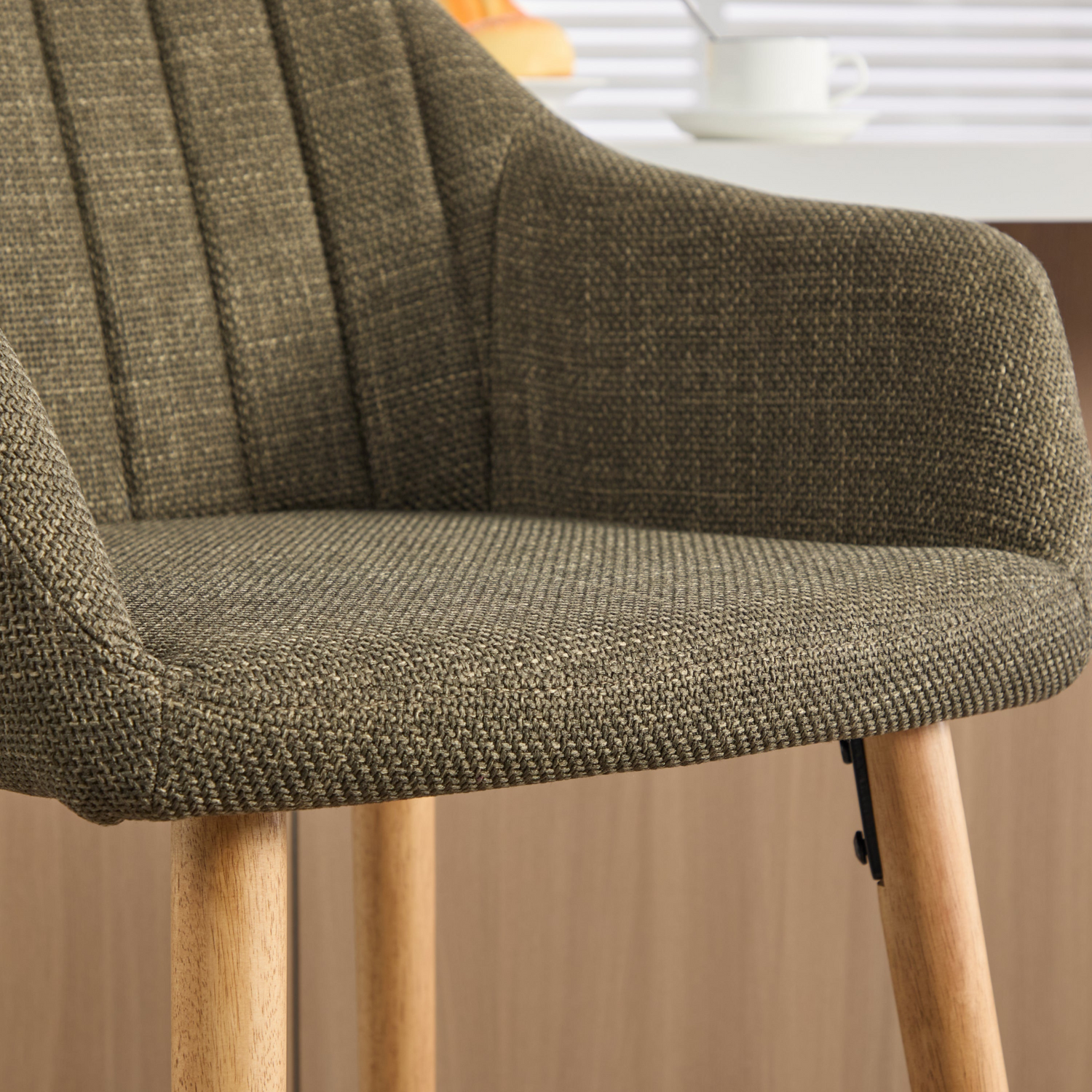 Modern linen upholstered bar stool with back, armrests, footrest, and solid wood legs by Start2Finish