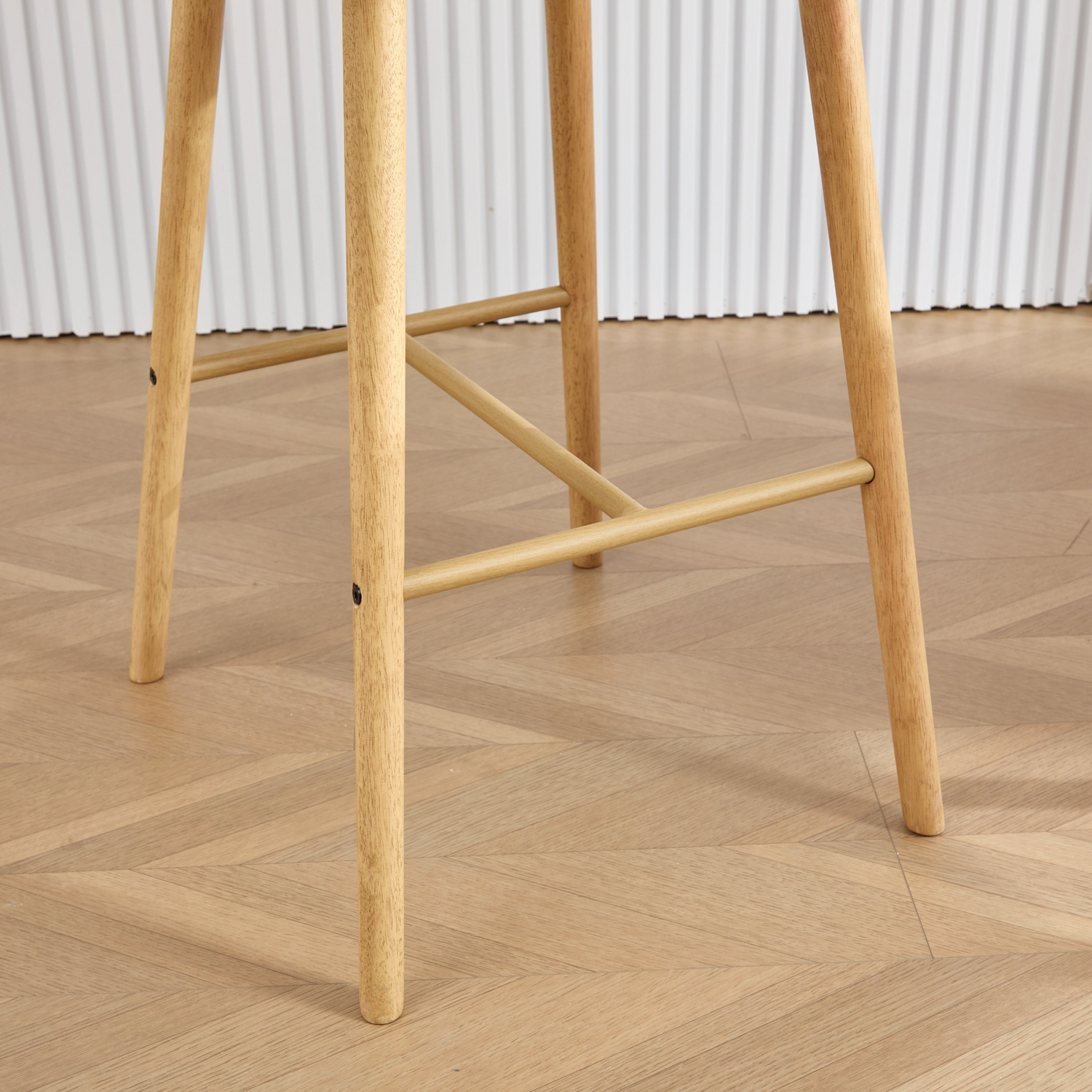 Modern linen upholstered bar stool with back, armrests, footrest, and solid wood legs by Start2Finish