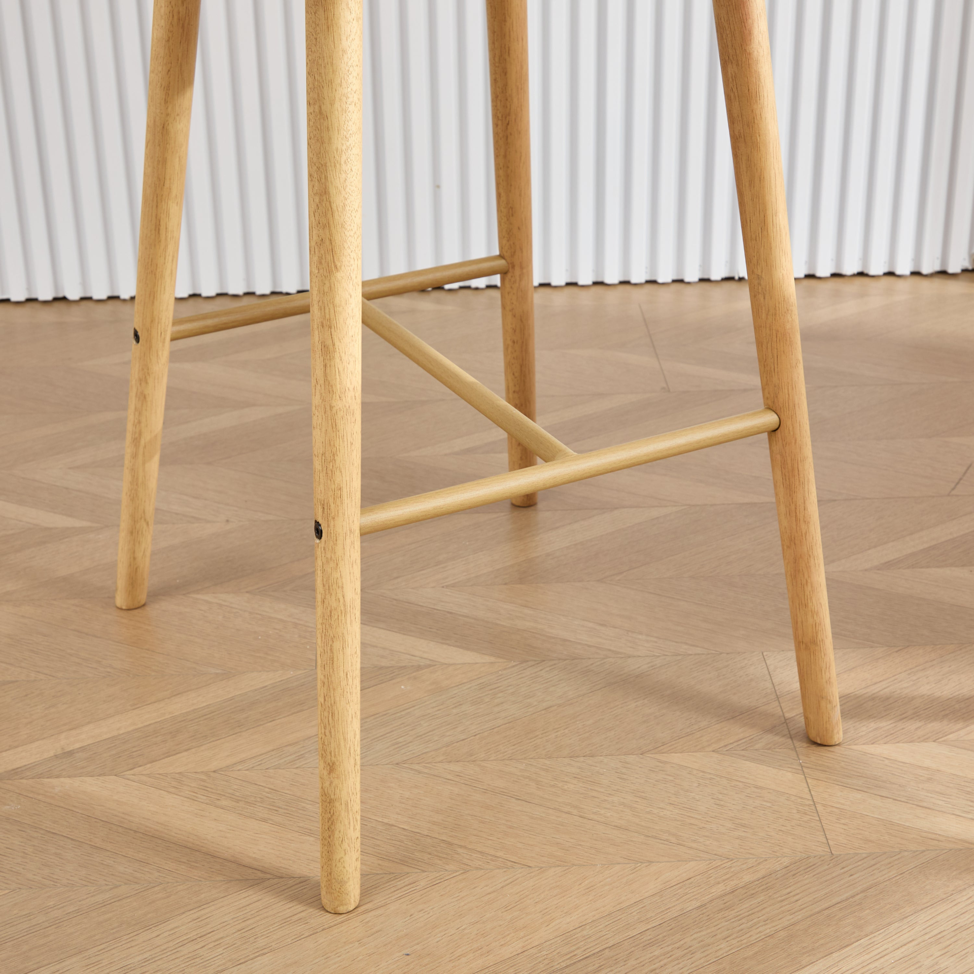 Modern linen upholstered bar stool with back, armrests, footrest, and solid wood legs by Start2Finish