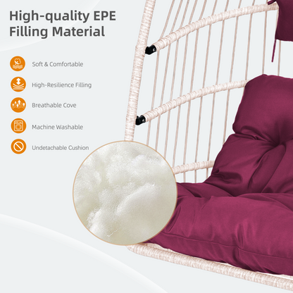 Outdoor hanging egg chair with stand, patio wicker rattan swing with cushion by Start2Finish, shown with a cozy cushion inside