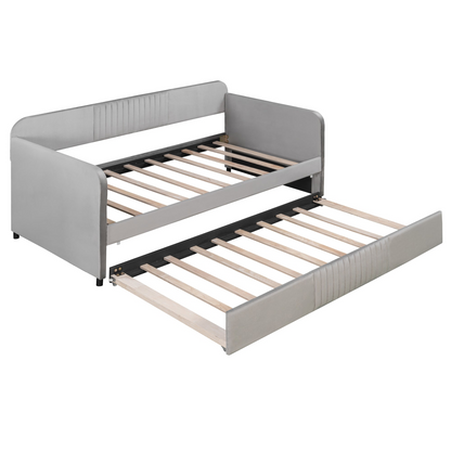 Start2Finish twin size upholstered daybed sofa bed with trundle and wooden slat base, featuring plush fabric and clean design.