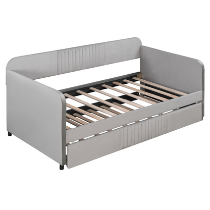 Start2Finish twin size upholstered daybed sofa bed with trundle and wood slat base, shown with plush cushions and wooden frame.