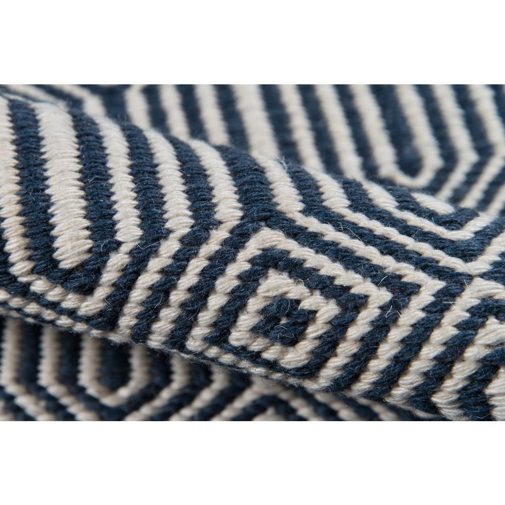 Contemporary navy rectangle area rug by Start2Finish, 5x7.6 feet, with a modern geometric pattern on a soft fabric surface.