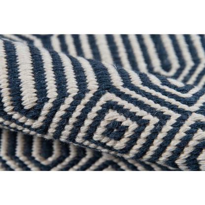 Contemporary navy rectangle area rug by Start2Finish, 5x7.6 feet, with a modern geometric pattern on a soft fabric surface.