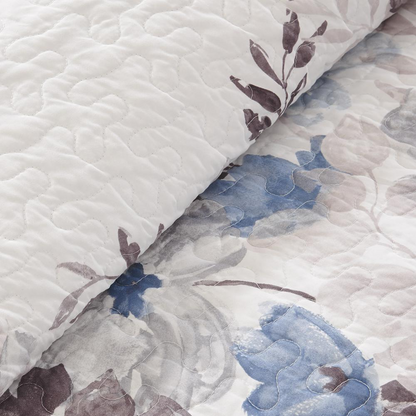 Start2Finish 6-piece printed quilt set with matching throw pillows, featuring colorful floral and geometric patterns on soft bedding.