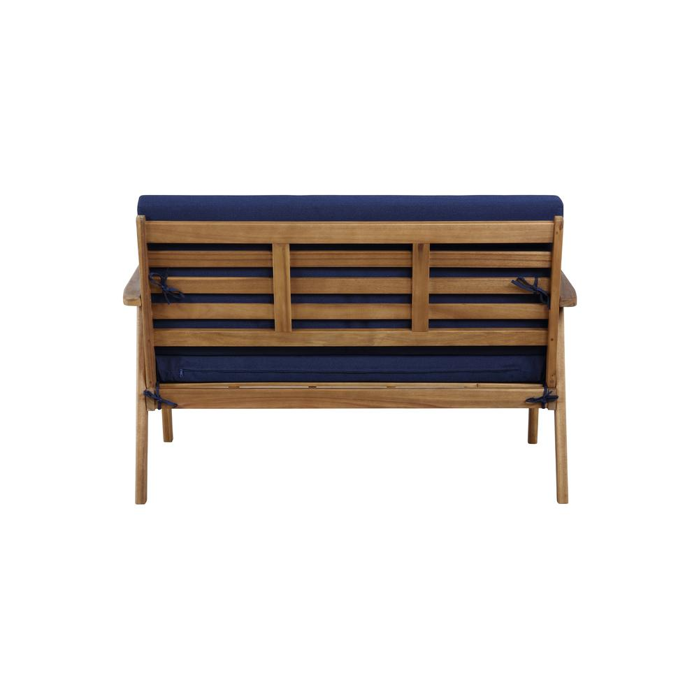 Start2Finish Cole outdoor 4-piece chat set with blue cushions, including seats and a coffee table on a patio.
