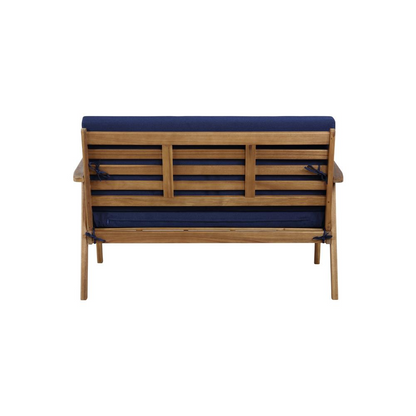 Start2Finish Cole outdoor 4-piece chat set with blue cushions, including seats and a coffee table on a patio.