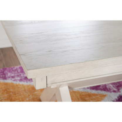 Distressed white wooden dining table by Start2Finish with a rustic design, featuring a sturdy tabletop and classic legs.