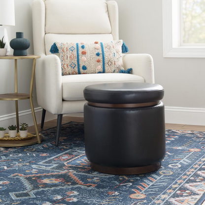 Black PU Blanche Storage Ottoman by Start2Finish with a cushioned top and spacious interior for versatile storage and seating.