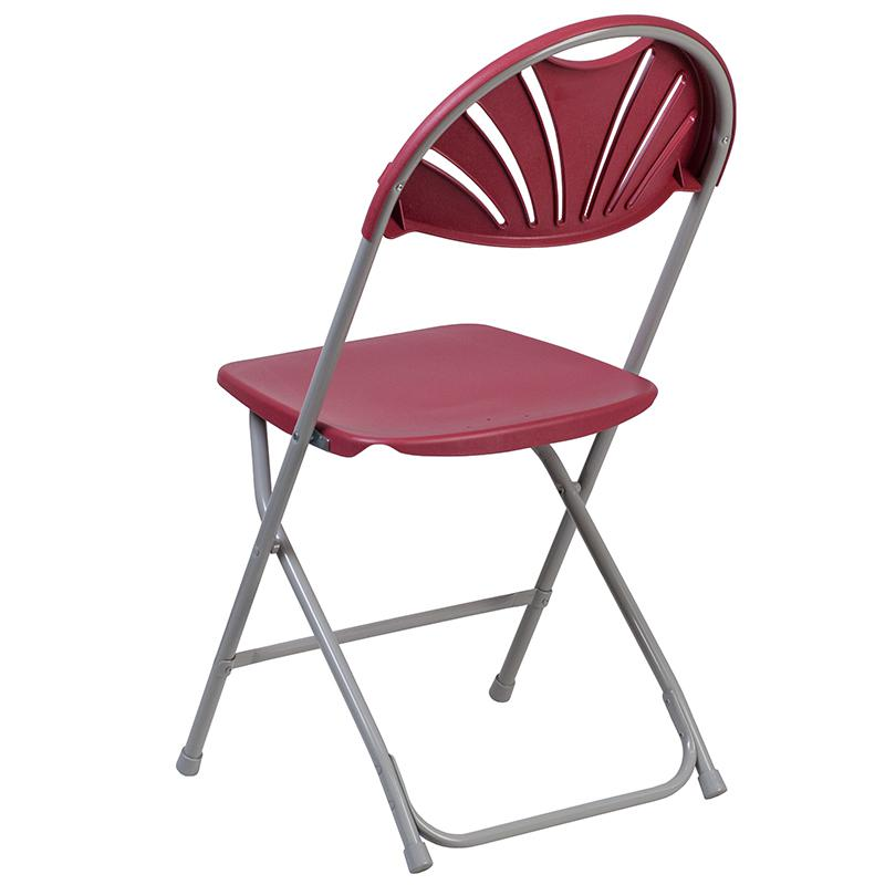 Two burgundy plastic folding chairs from Start2Finish HERCULES Series with fan back design and 650 lb. weight capacity.