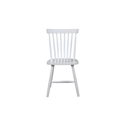 Set of 2 white Lyra side chairs by Start2Finish with sleek modern design and smooth curved backs in natural light.