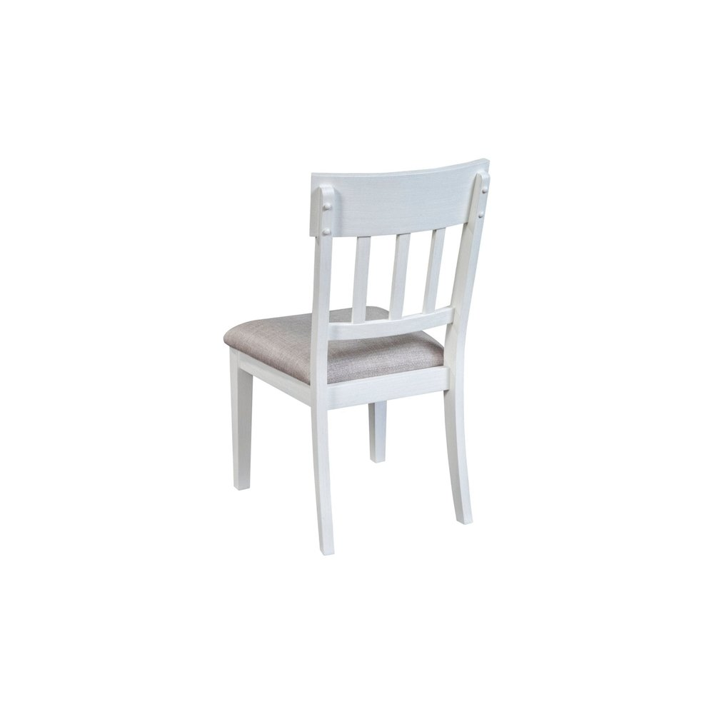 Set of 2 white Donham side chairs by Start2Finish with sleek design and wooden legs, shown from a side angle.