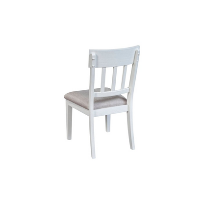 Set of 2 white Donham side chairs by Start2Finish with sleek design and wooden legs, shown from a side angle.