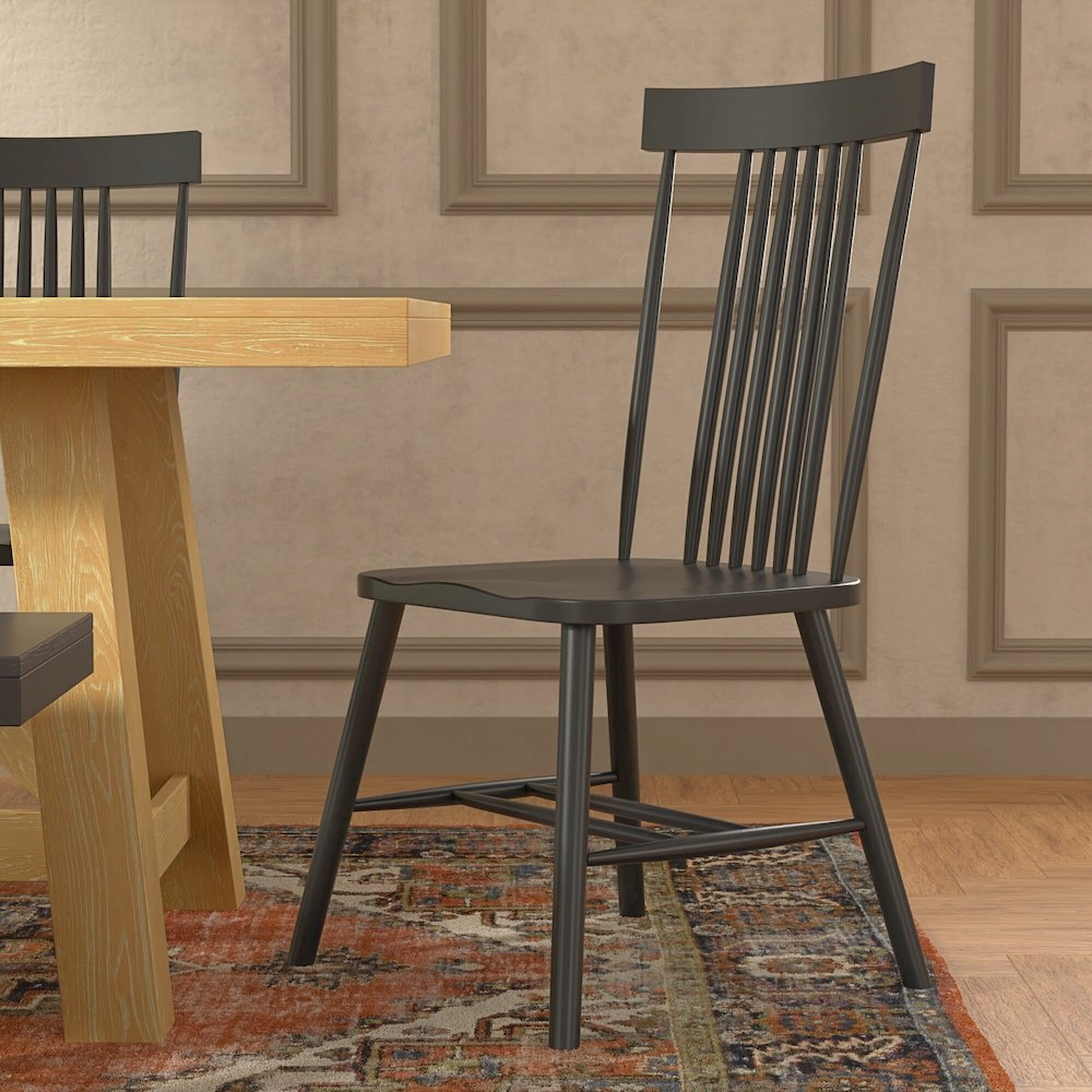 Black Eleanor side chair by Start2Finish with a sleek, modern design and wooden legs, perfect for dining or accent seating.