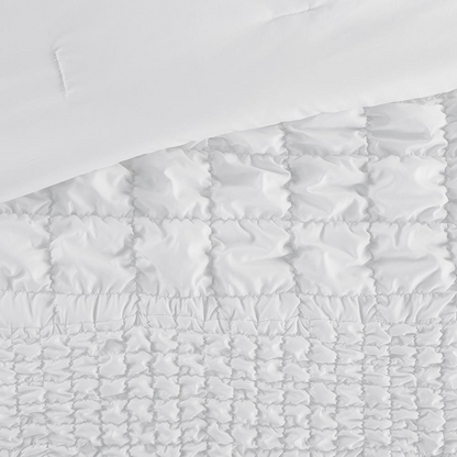 Evelyn 3-piece stripe ruched comforter set in white from Start2Finish, showing the textured, ruched bed comforter and matching pillow shams.