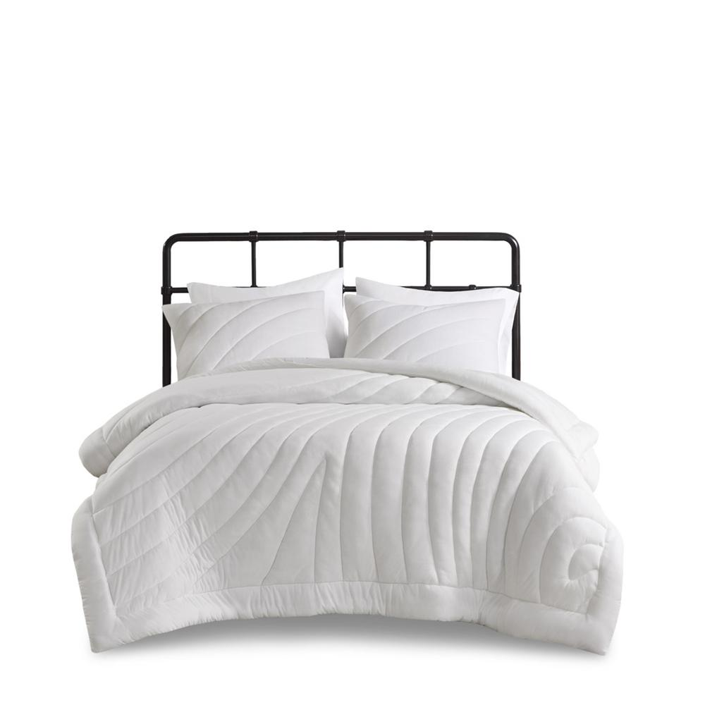 Start2Finish Poly Jersey Puffy Comforter Set in soft, quilted fabric with a cozy, plush appearance on a bed.