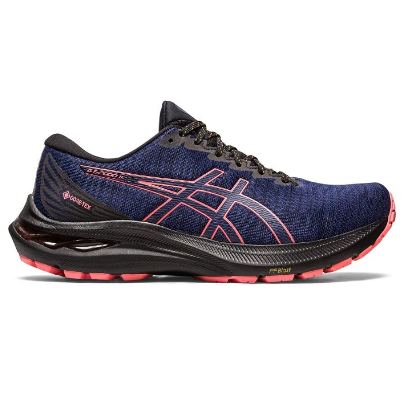 Asics GT 2000 11 GTX W running shoes in gray and teal, featuring waterproof GORE-TEX material and supportive design.