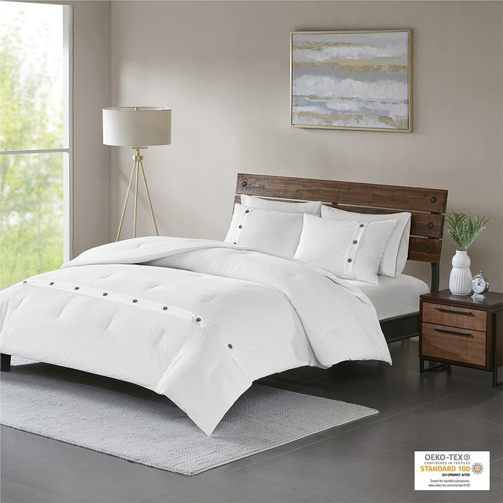 Start2Finish 3-piece cotton waffle weave comforter set with matching pillows on a bed, showcasing soft, textured bedding.