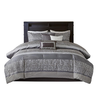 Start2Finish 7-piece jacquard comforter set with intricate woven pattern and matching pillow shams on a neatly made bed.