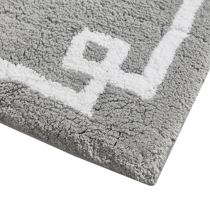 Start2Finish cotton tufted bath rug 20x30 features soft, textured white fabric perfect for bathroom decor.