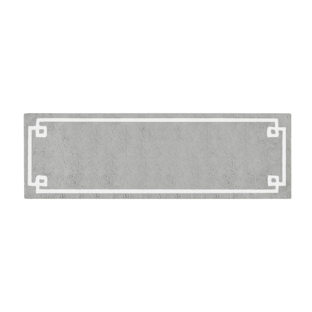 Cotton tufted bath rug in white with plush, textured surface, measuring 20x30 inches, by Start2Finish.