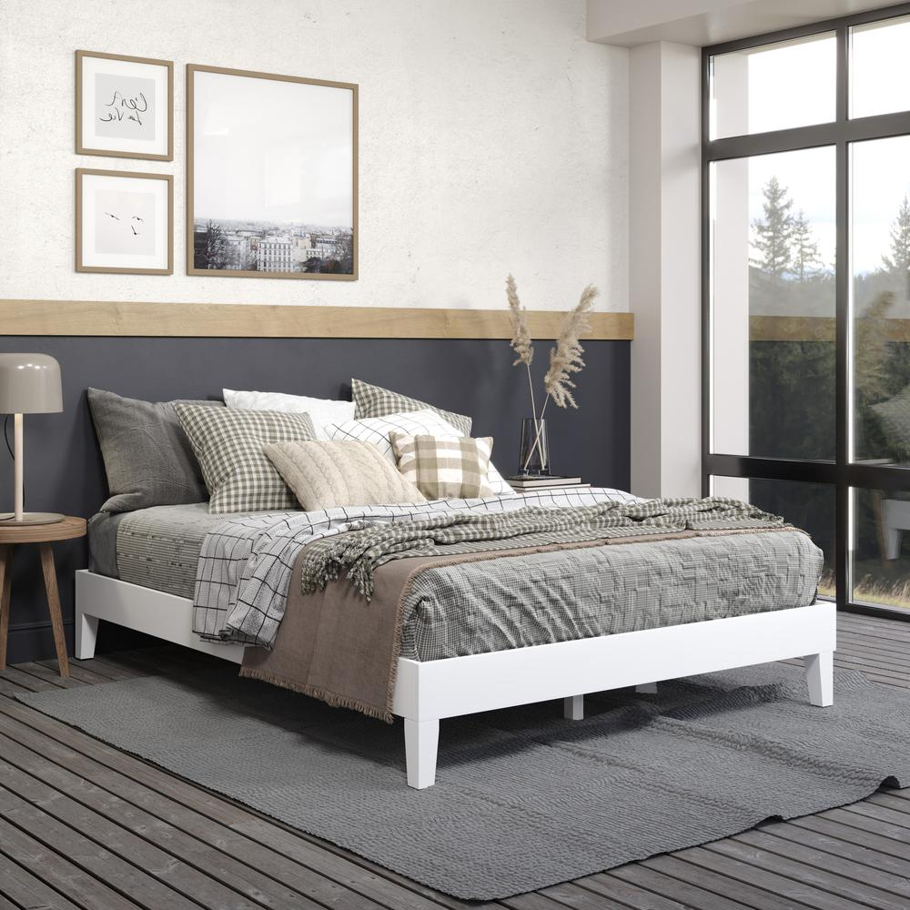 White Nix solid wood queen platform bed by Start2Finish with a sleek, modern design and sturdy wooden frame.