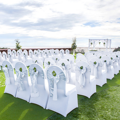 White VEVOR stretch spandex folding chair cover on a chair, demonstrating a fitted, washable protective slipcover for events and parties.