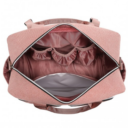 Start2Finish EQ2411 Kono diaper changing tote bag in pink with built-in changing mat, waterproof design, and thermal insulation.
