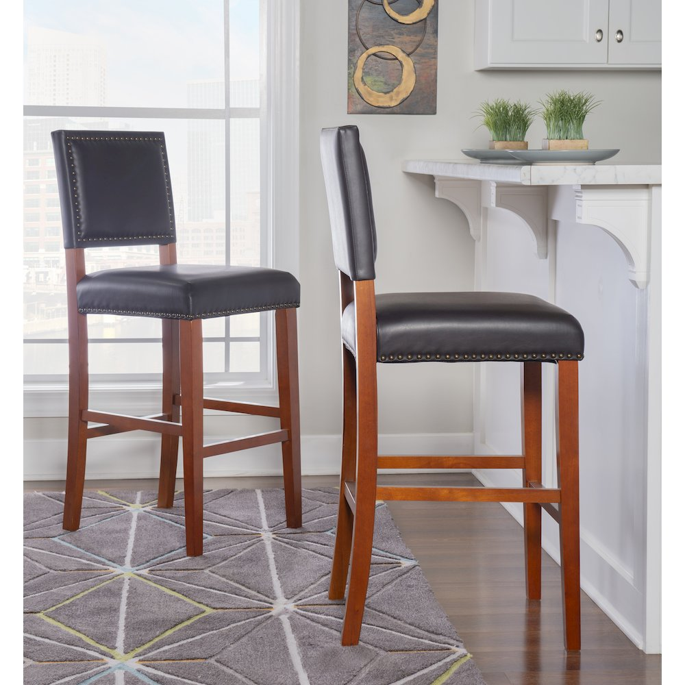Black Brook Bar Stool by Start2Finish with sleek metal frame and cushioned seat, ideal for modern kitchen or bar area.