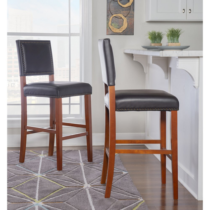 Black Brook Bar Stool by Start2Finish with sleek metal frame and cushioned seat, ideal for modern kitchen or bar area.