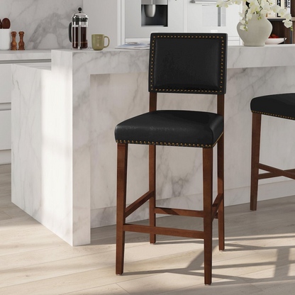 Black Brook Bar Stool by Start2Finish featuring a sleek metal frame and a cushioned seat for modern kitchen or bar area use.
