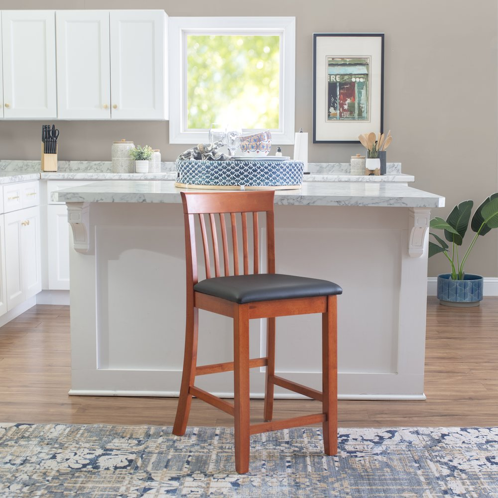Start2Finish Triena 24-inch craftsman counter stool with wooden seat and backrest, featuring a sturdy metal frame and footrest.