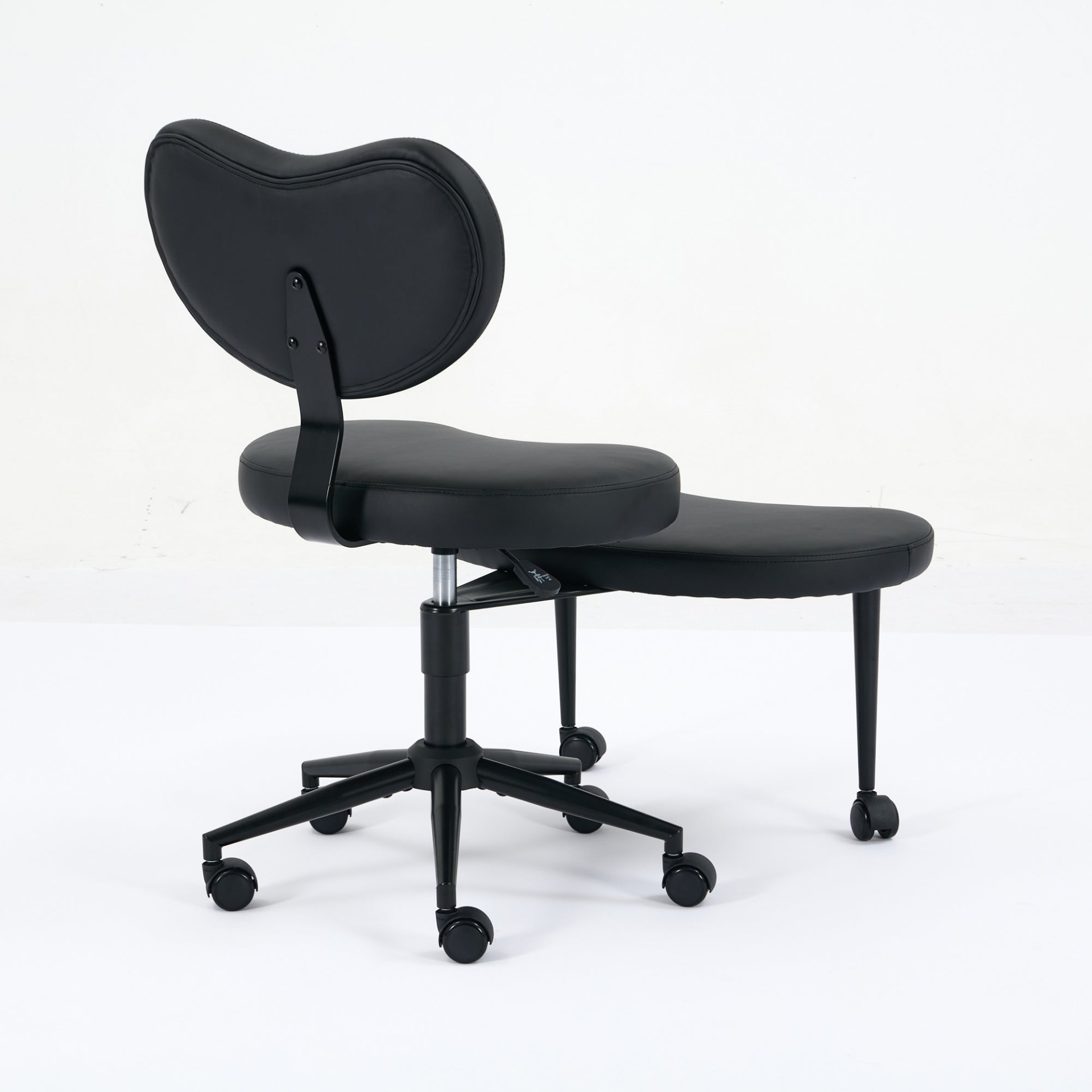 Black PU leather office chair with USB port, power access, and swivel function, suitable for home office or vanity desk.