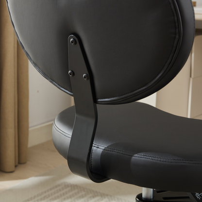 Black PU leather office chair by Start2Finish with USB port, power access, and swivel function for home or vanity desk use.