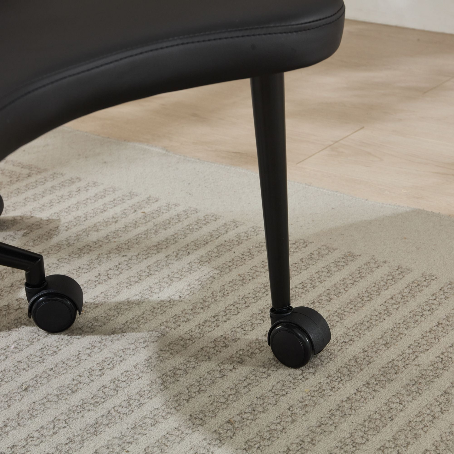 Black PU leather office chair with USB port, power access, and swivel function for home office or vanity desk.