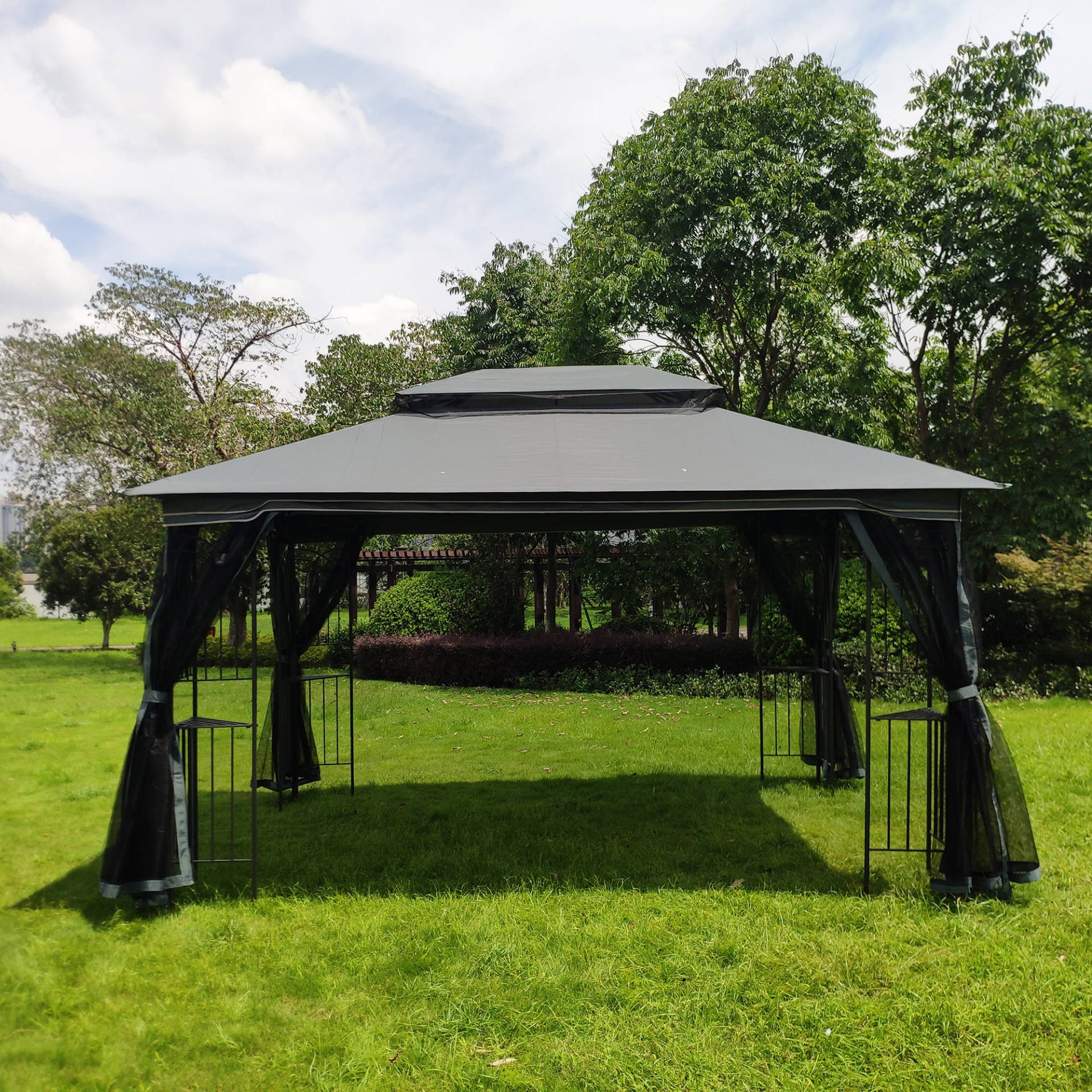 Gray metal outdoor gazebo canopy with roof and storage, ideal for patio and outdoor living spaces by Start2Finish
