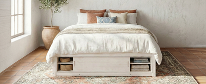 Start2Finish platform bed frame with solid wood and MDF, featuring four storage drawers, footboard cubby, and padded headboard.