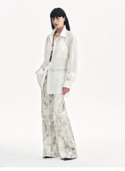 "Phantom" original snake print flared denim trousers