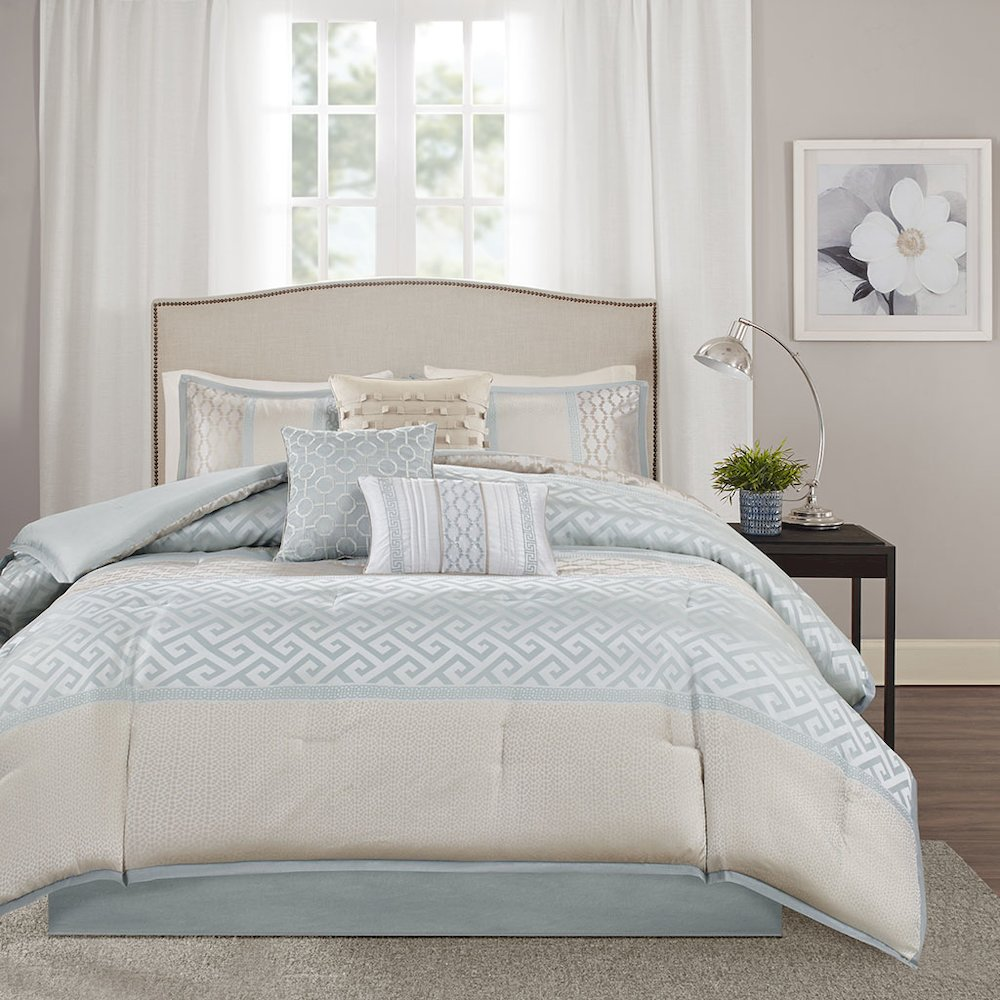 Start2Finish 7-piece comforter set with coordinating pillow shams and decorative pillows on a neatly made bed.