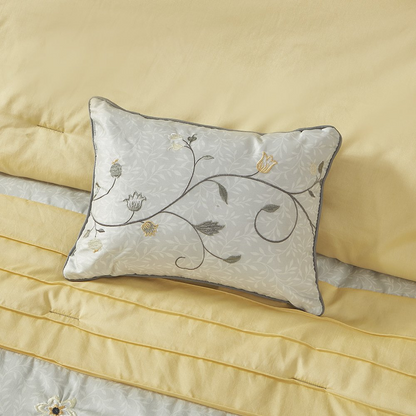 Start2Finish embroidered 7-piece comforter set featuring intricate floral embroidery and matching pillow shams on a cozy bed.