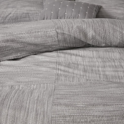 Walter 7-piece printed seersucker comforter set in grey from Start2Finish, featuring a textured seersucker fabric and matching pillow shams.