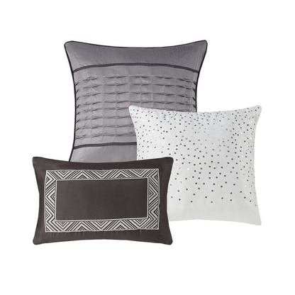 Start2Finish 7-piece jacquard comforter set with matching pillow shams and decorative pillows on a neatly made bed.