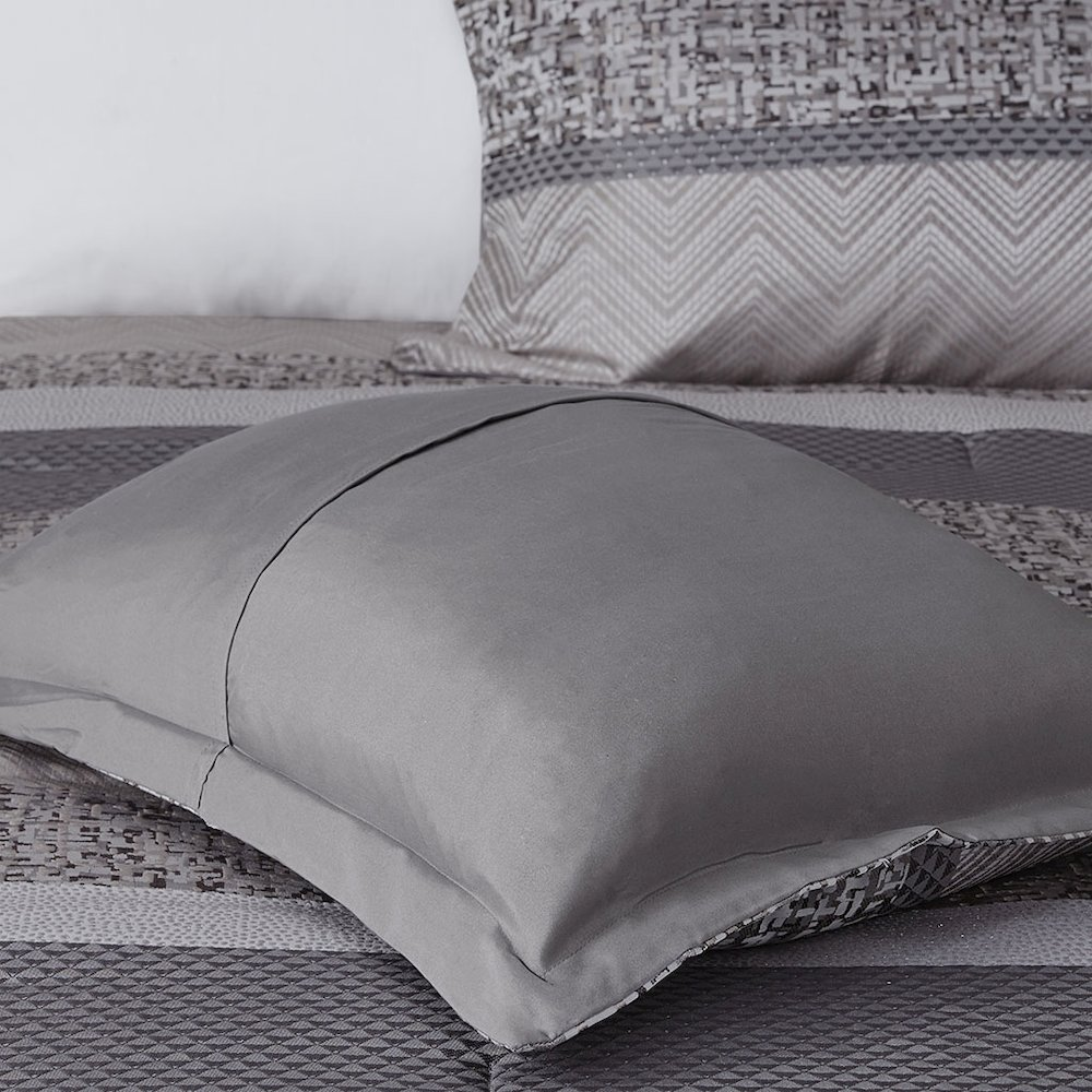 Start2Finish 7-piece Jacquard comforter set featuring a detailed woven pattern and coordinating pillow shams for a stylish bedroom look.