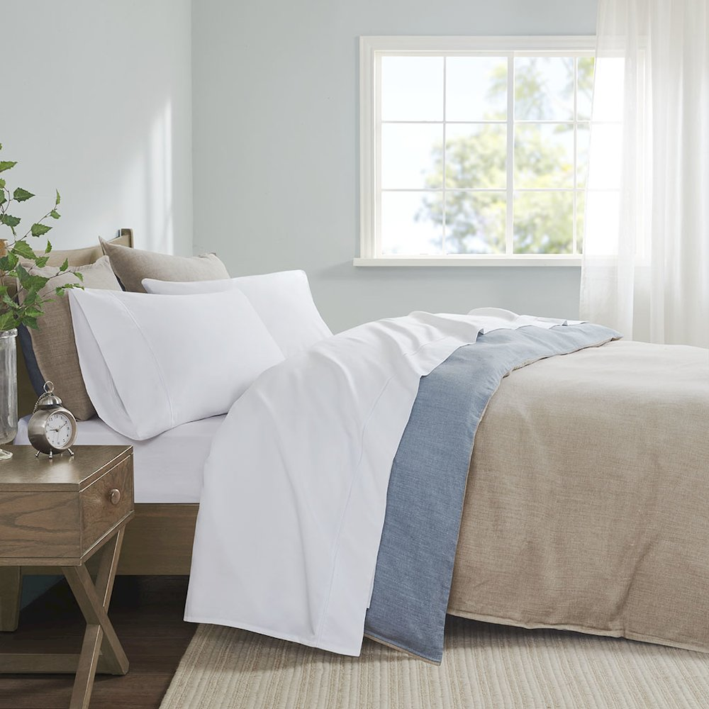 Start2Finish Pima Cotton Sheet Set with smooth, soft white sheets and pillowcases, showcasing the luxurious fabric and neat bedding arrangement.