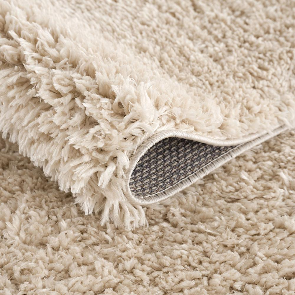 Super soft polyester shag area rug by Start2Finish with plush, thick pile in neutral tones, ideal for cozy living spaces.