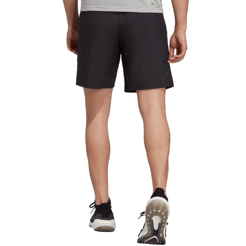 adidas Train Essentials Woven Shorts for men, lightweight athletic shorts in black with side pockets and adjustable waistband.
